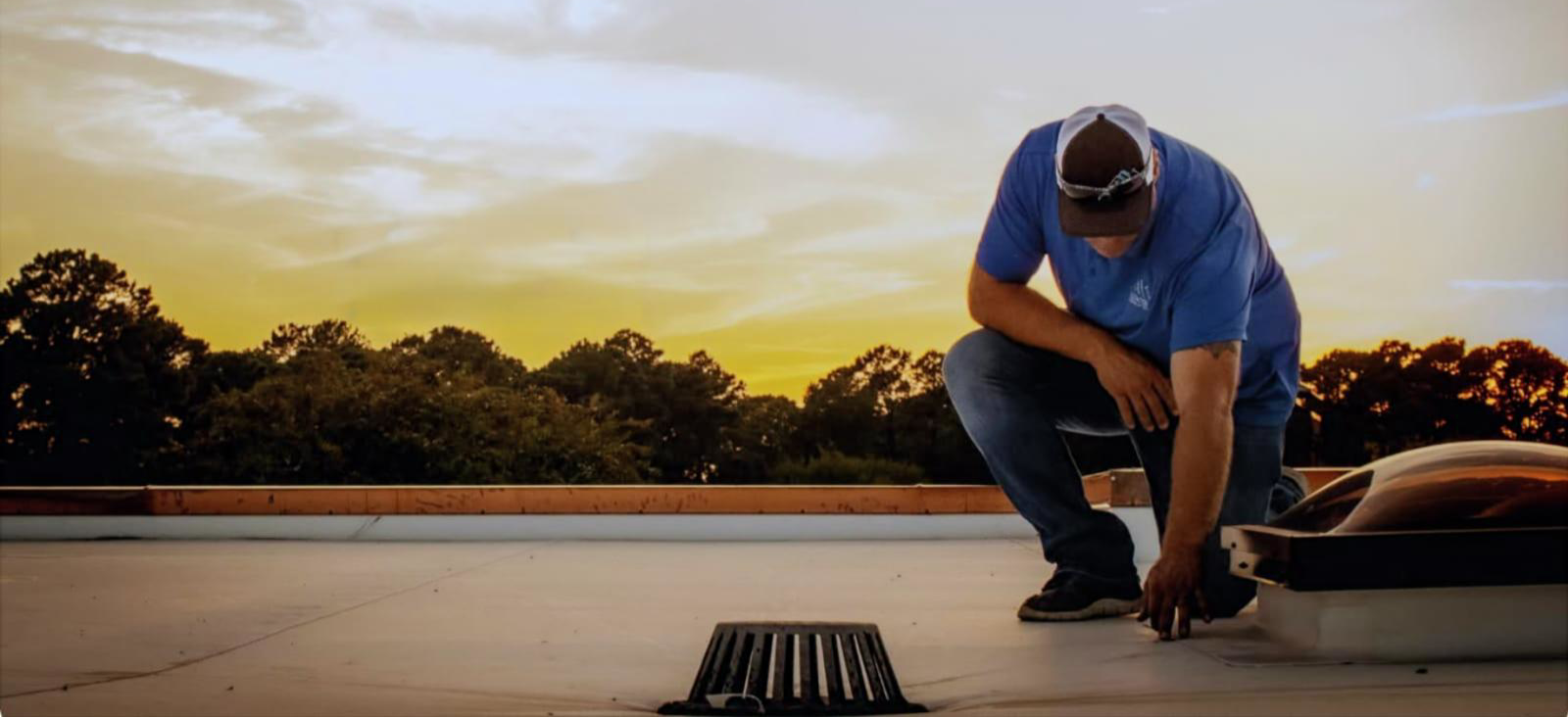 Elevation Roofing & Gutters logo on a professional roofing backdrop